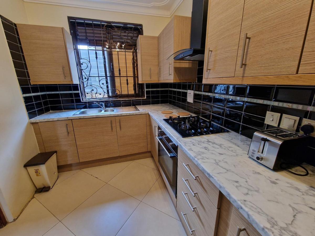 Eric Wilkins Apartments Lubowa Kültér fotó